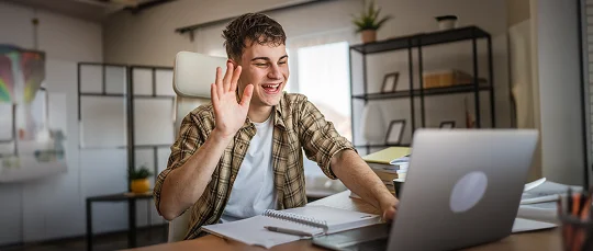 Student working with his laptop